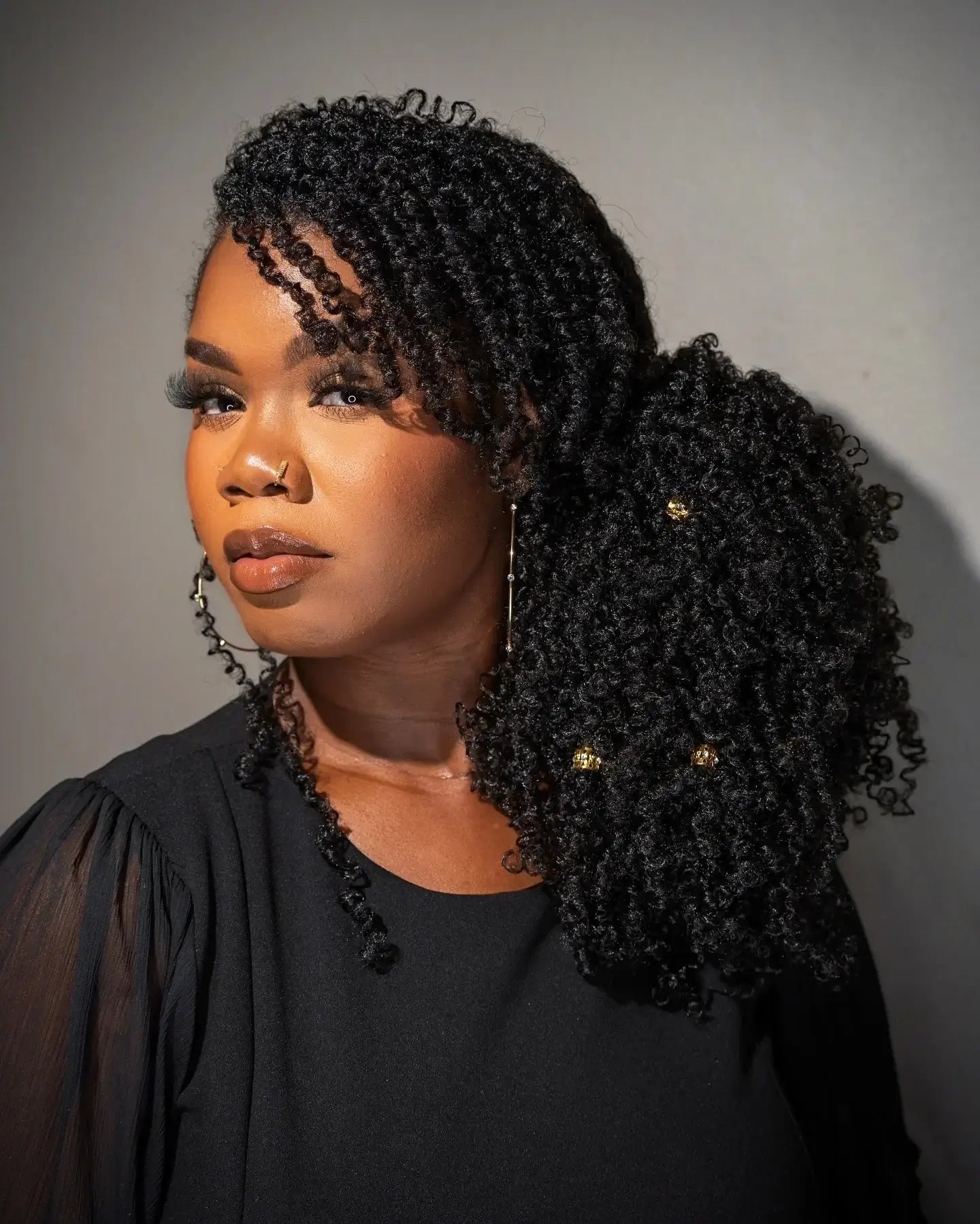 WigSpire Natural Black Crochet Hair Extensions in Yanky Twists style showcasing synthetic hair for a trendy look.